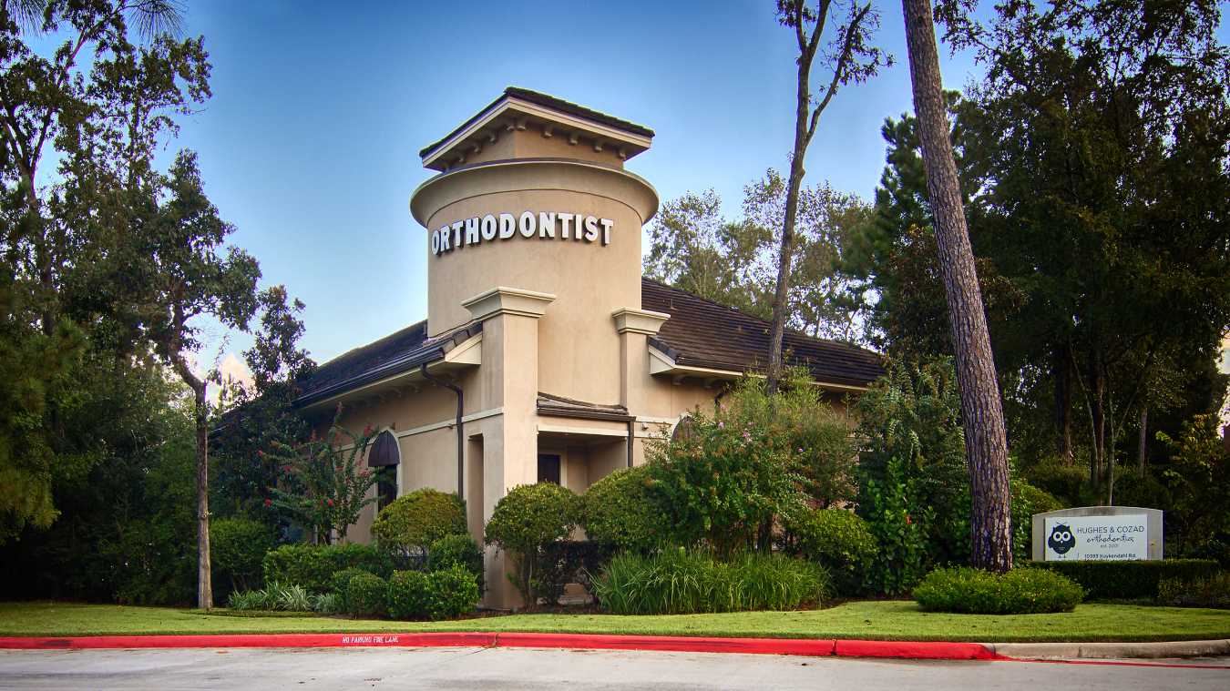 Welcome to Hughes & Cozad Orthodontics in The Woodlands Outside view of Hughes & Cozad Orthodontics